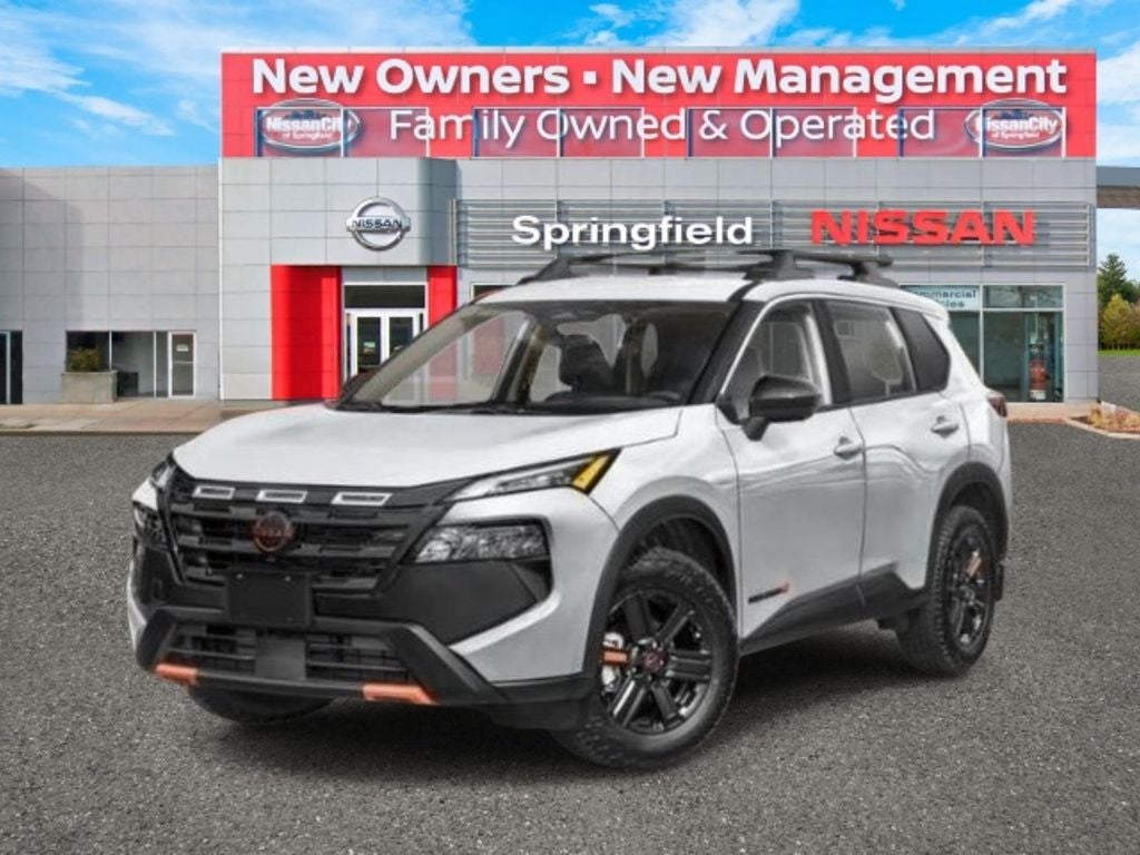 2026 Nissan Rogue Rock Creek® in Everest White Pearl Tricoat — front three-quarter view