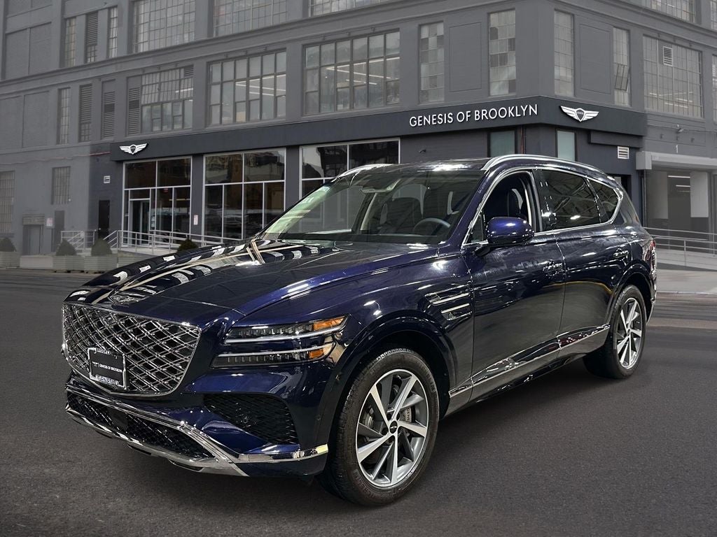 2025 Genesis GV80 3.5T Advanced in Capri Blue — front three-quarter view