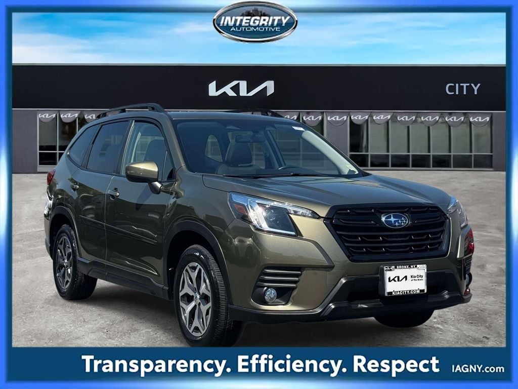 2023 Subaru Forester Premium in Autumn Green Metallic — front three-quarter view