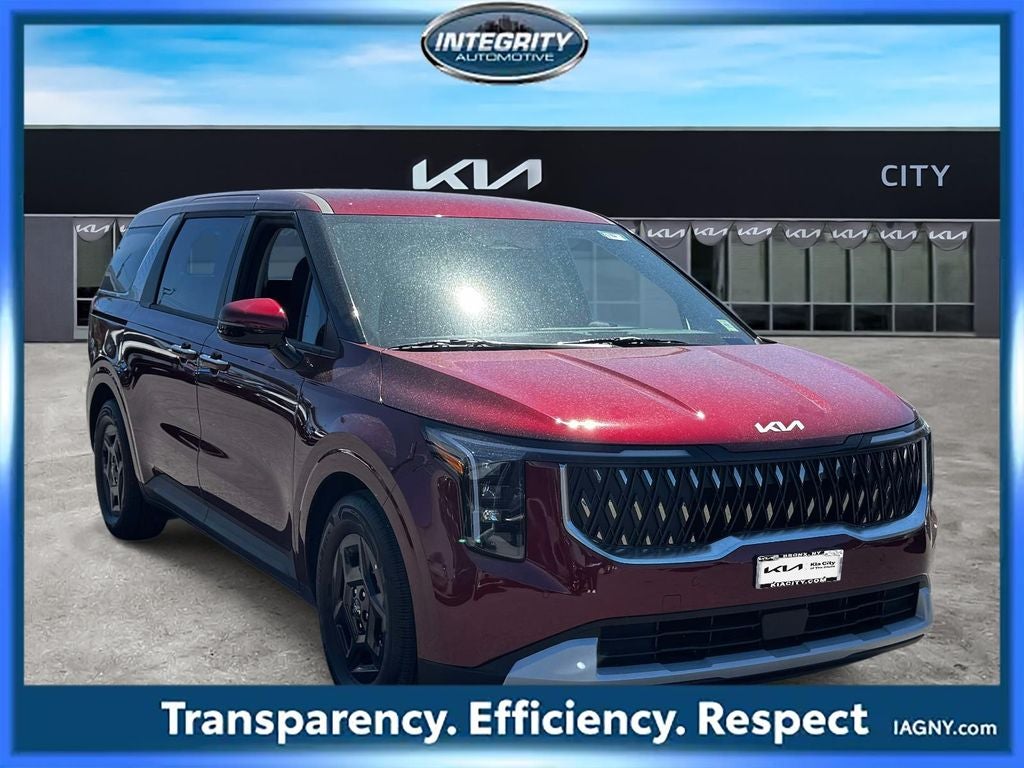 2026 Kia Carnival LXS in Flare Red — front three-quarter view